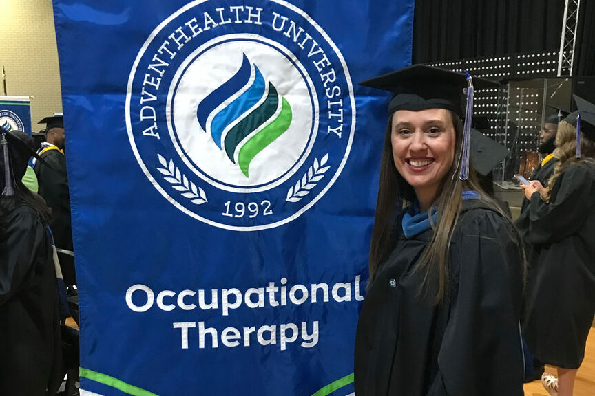 Image of Bryn Nadeau a graduate of the occupational therapy program in regalia.