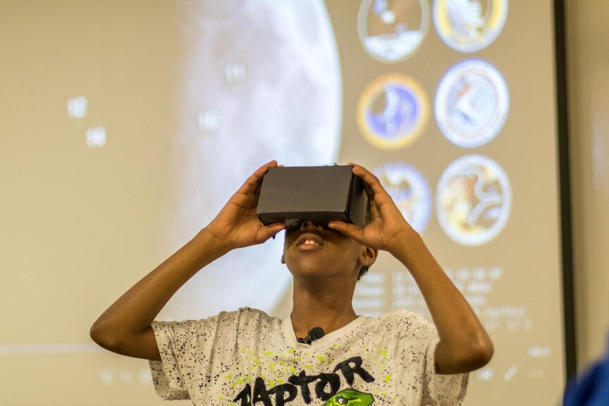 Boy using a VR headset