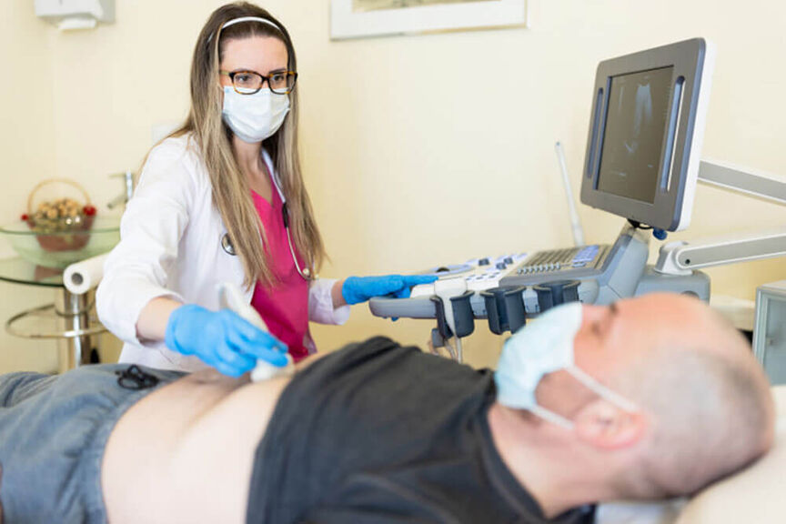sonographer-examining-patient