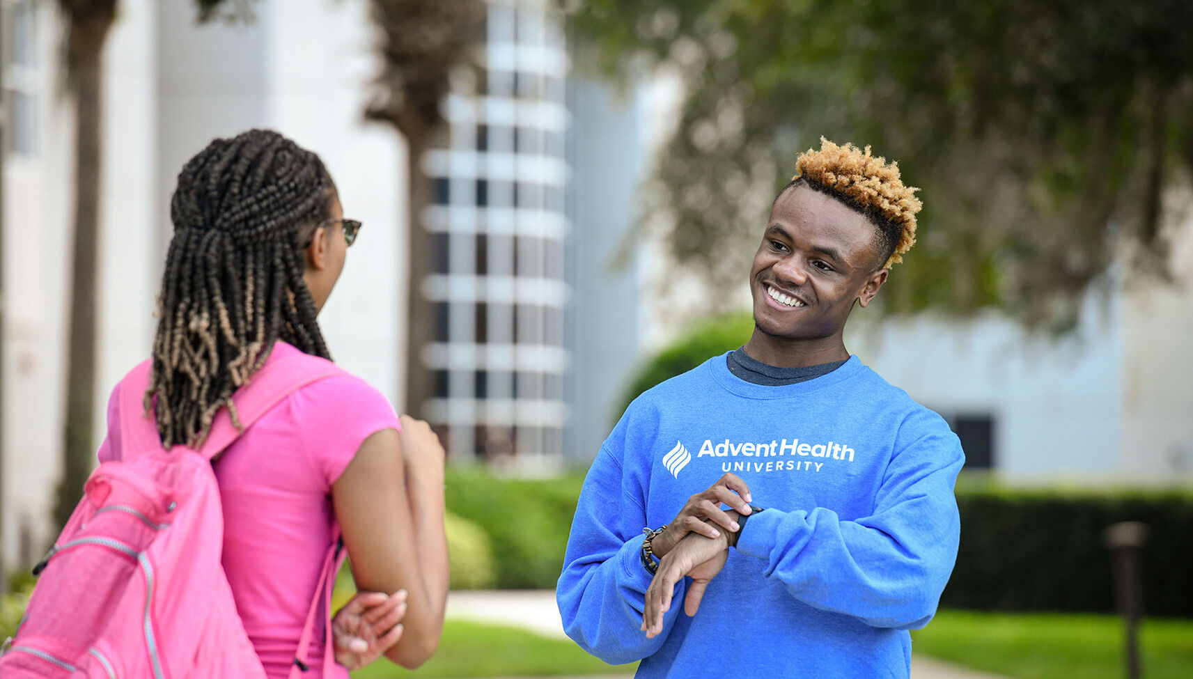 A student wearing an AHU sweater