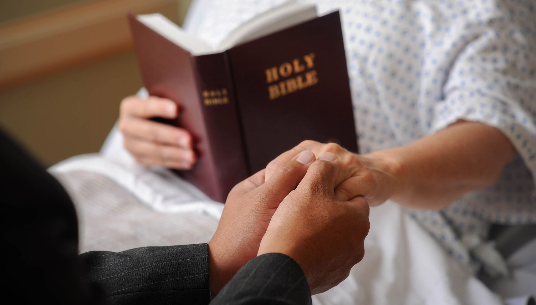 Chaplain with patient
