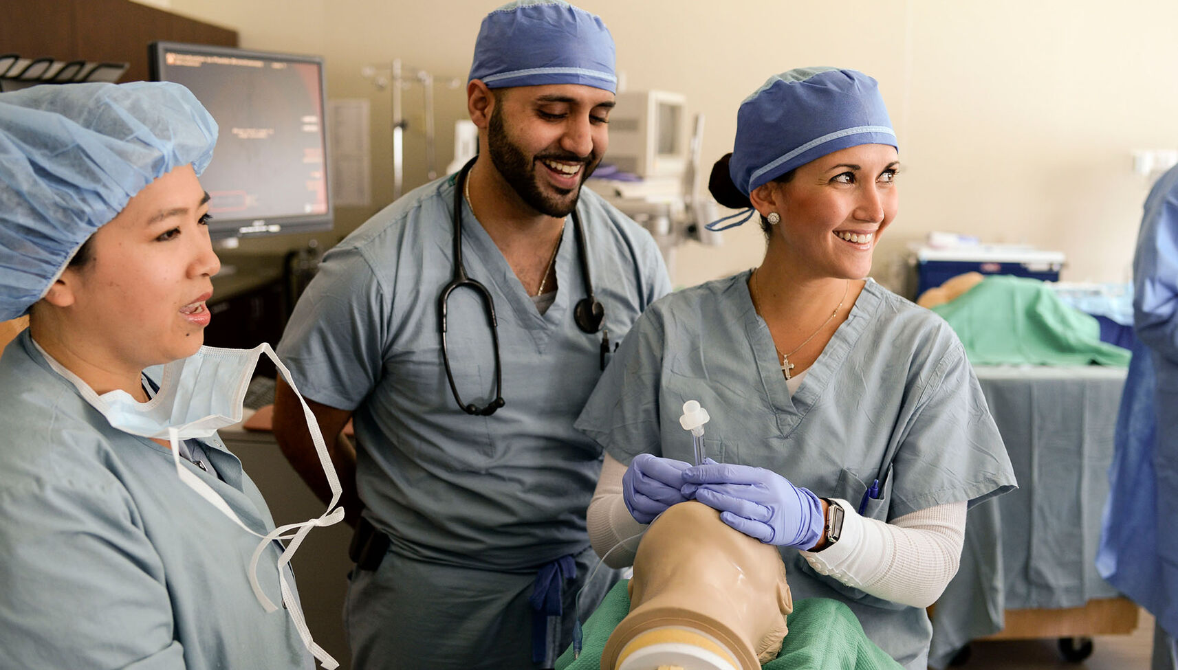 Nurse anesthesia students practicing intubation procedures in the skills lab
