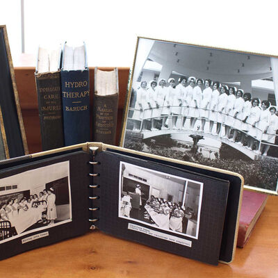 Frames and photo albums containing pictures from Florida Hospital School of Nursing