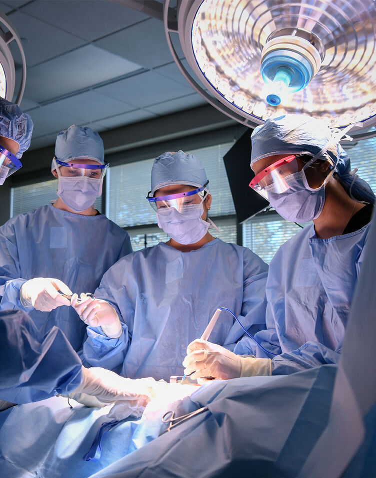A group of physician assistant students running a surgery simulation